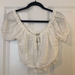 Brandy Melville white top. Price tags/never worn.
